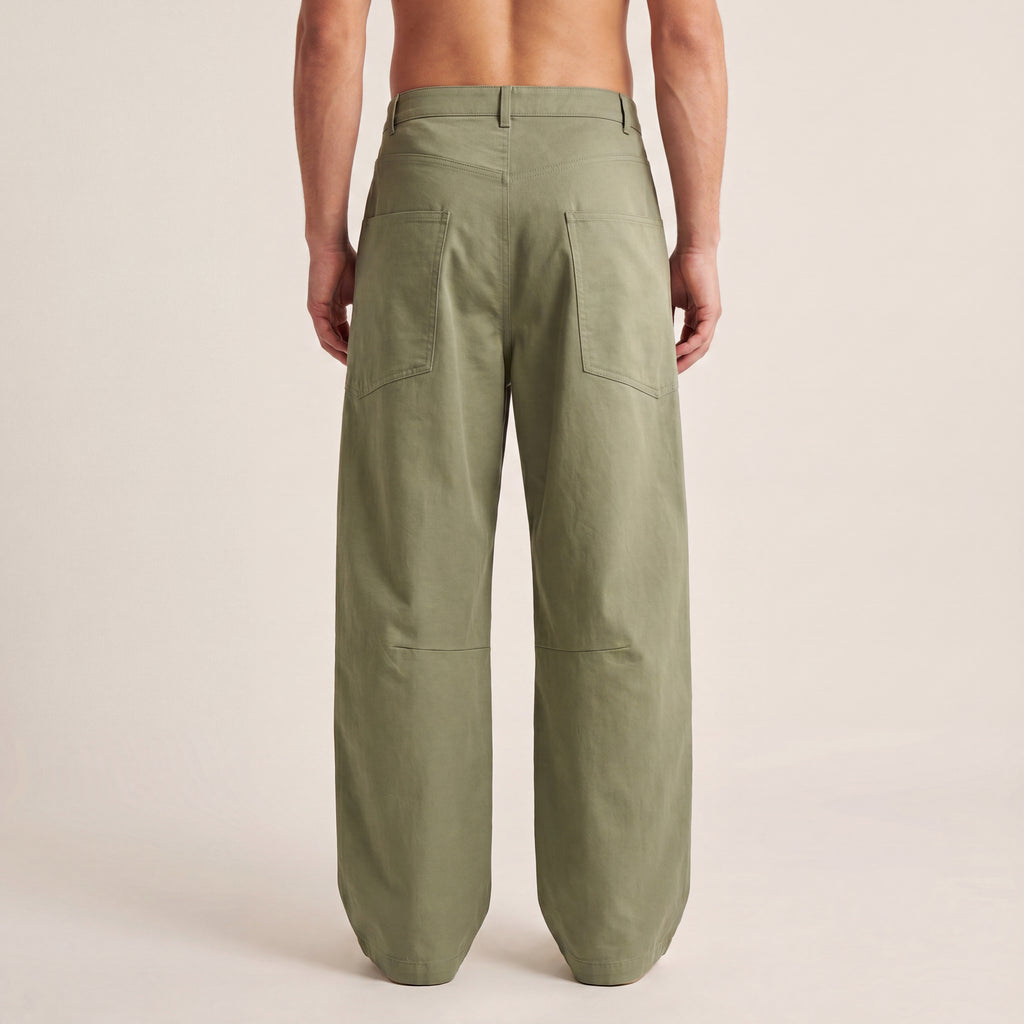 The Barrel Pant in Gray Green, back on-body view showing rear patch pockets and the full barrel-leg silhouette.