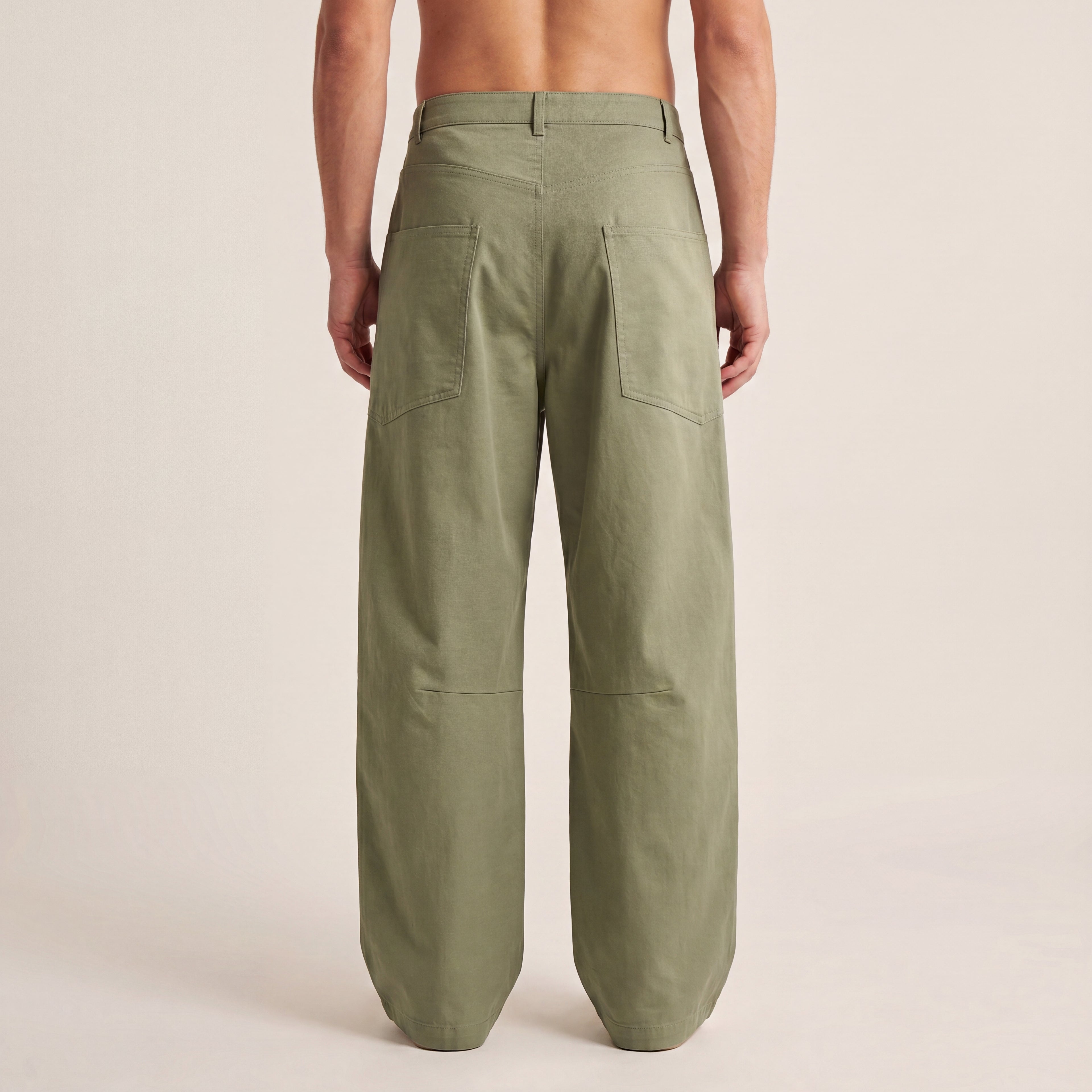 The Barrel Pant in Gray Green, back on-body view showing rear patch pockets and the full barrel-leg silhouette.